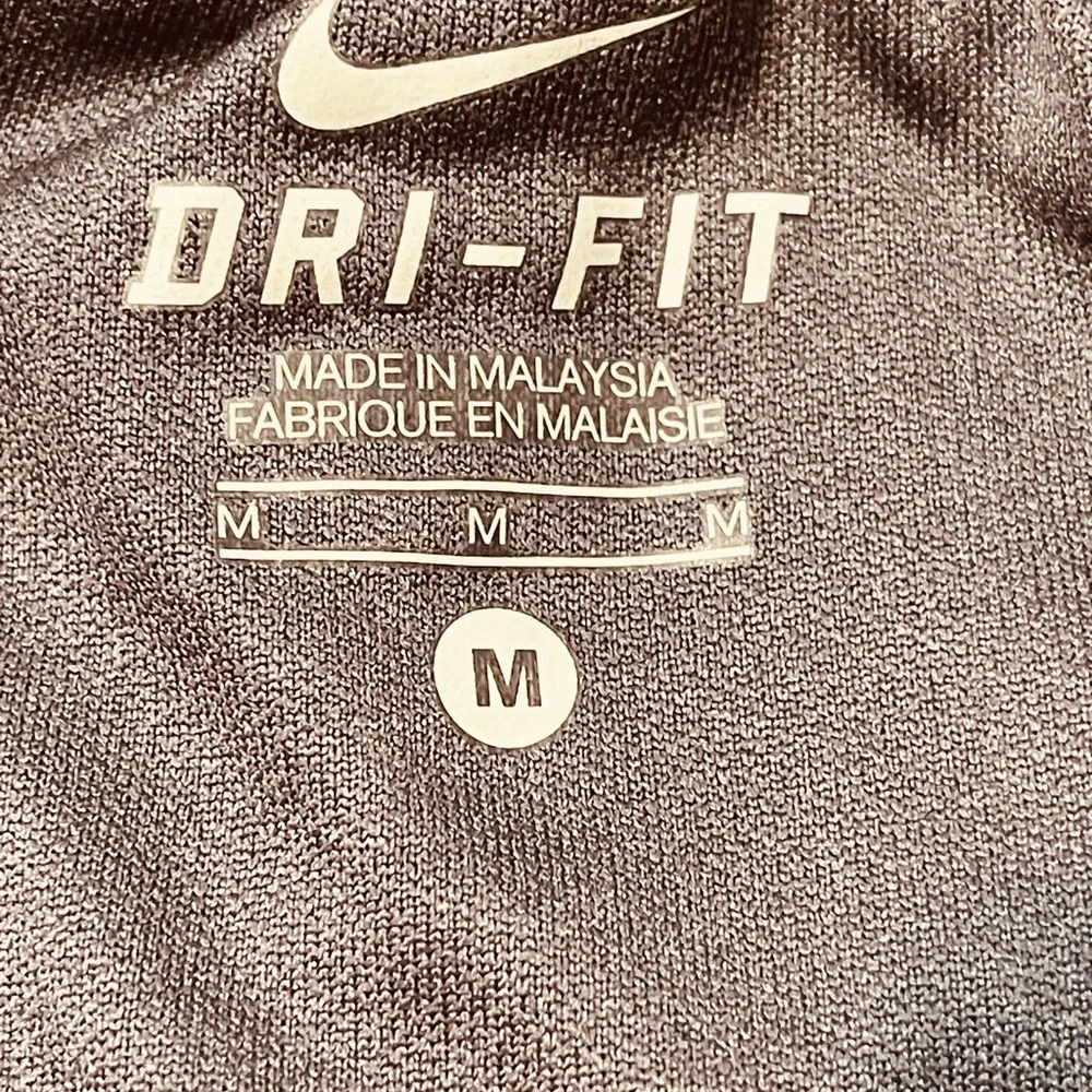 Nike Women's Gray Shorts with Pink and Green Accents